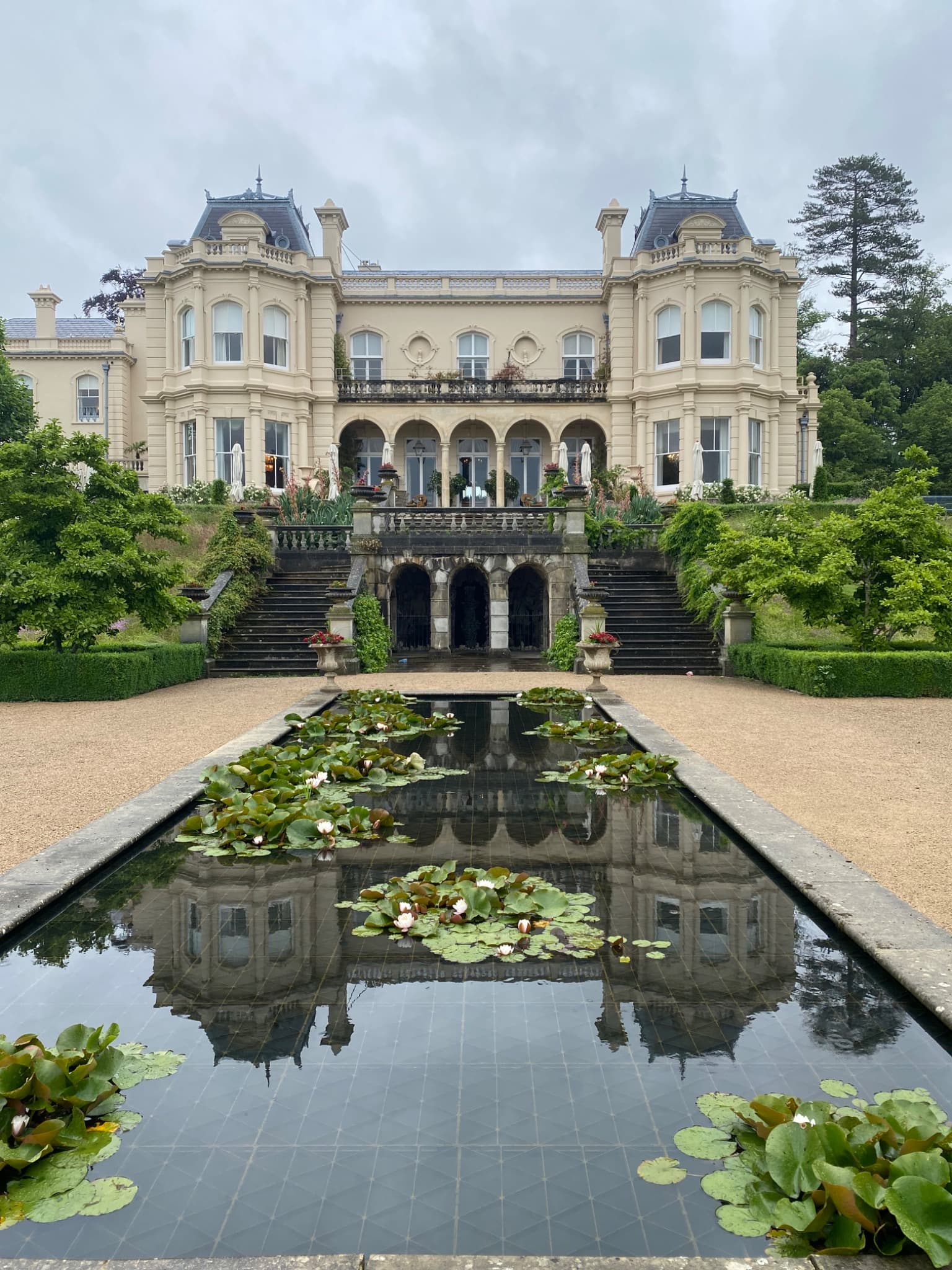 Beaverbrook Estate house reflected in the garden lily pond