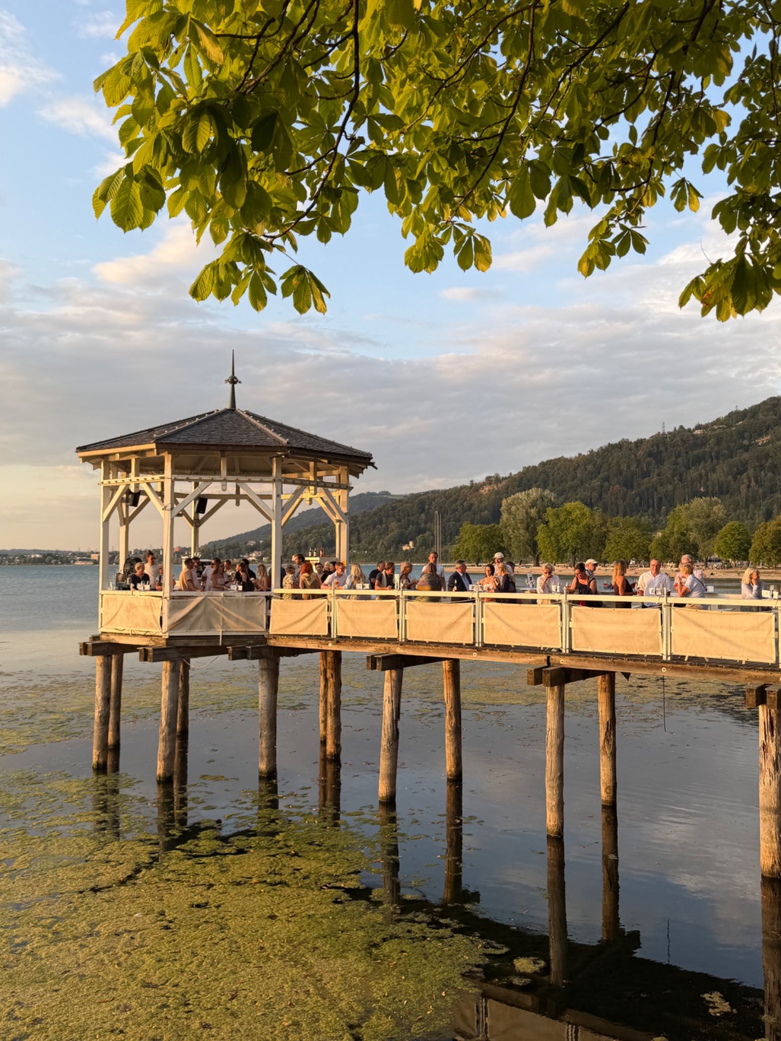 Fischersteg pier and bar in the evening light on Lake Constance